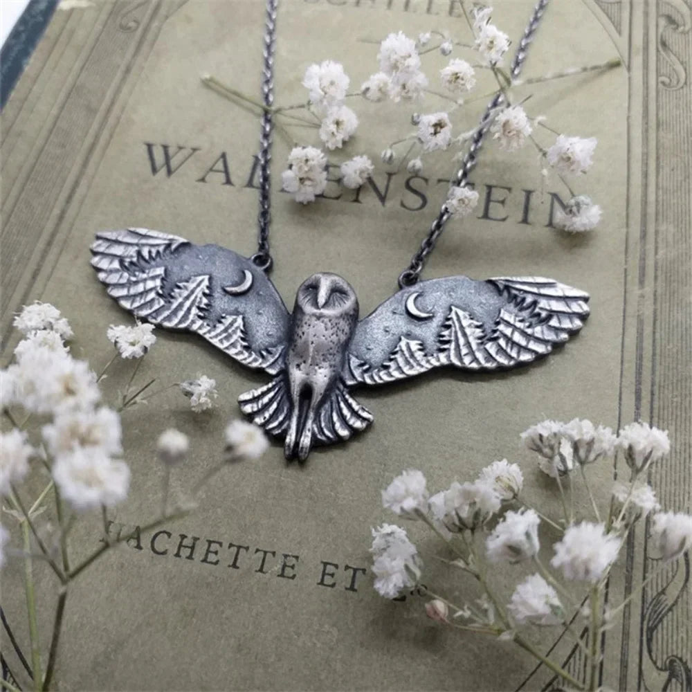Ketting met uil- en maanmotief