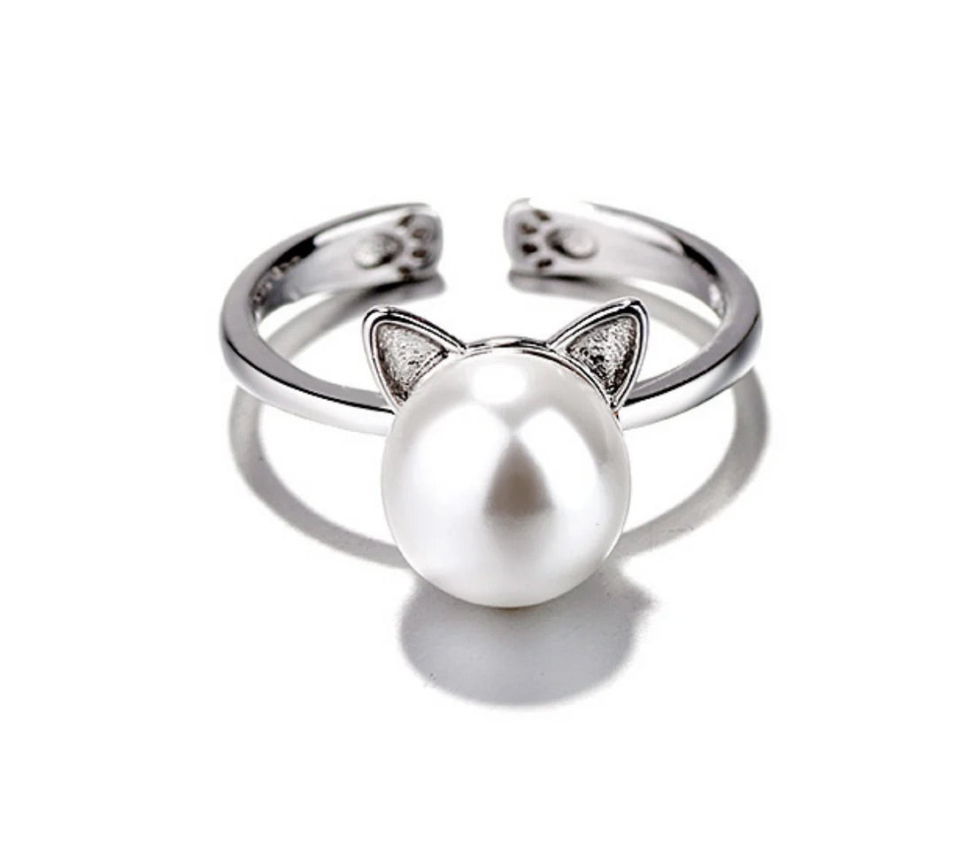 Ketting, oorbellen en ring met katmotief