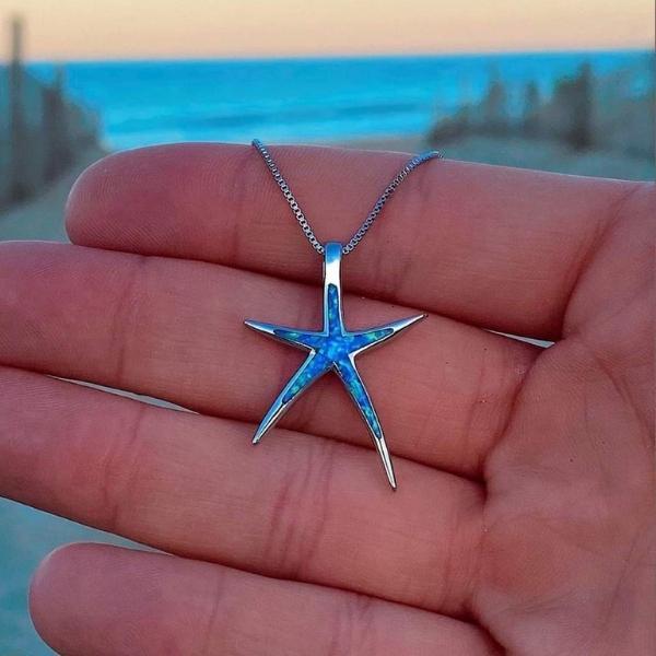 Ketting met zeestermotief en blauwe opaalaccenten