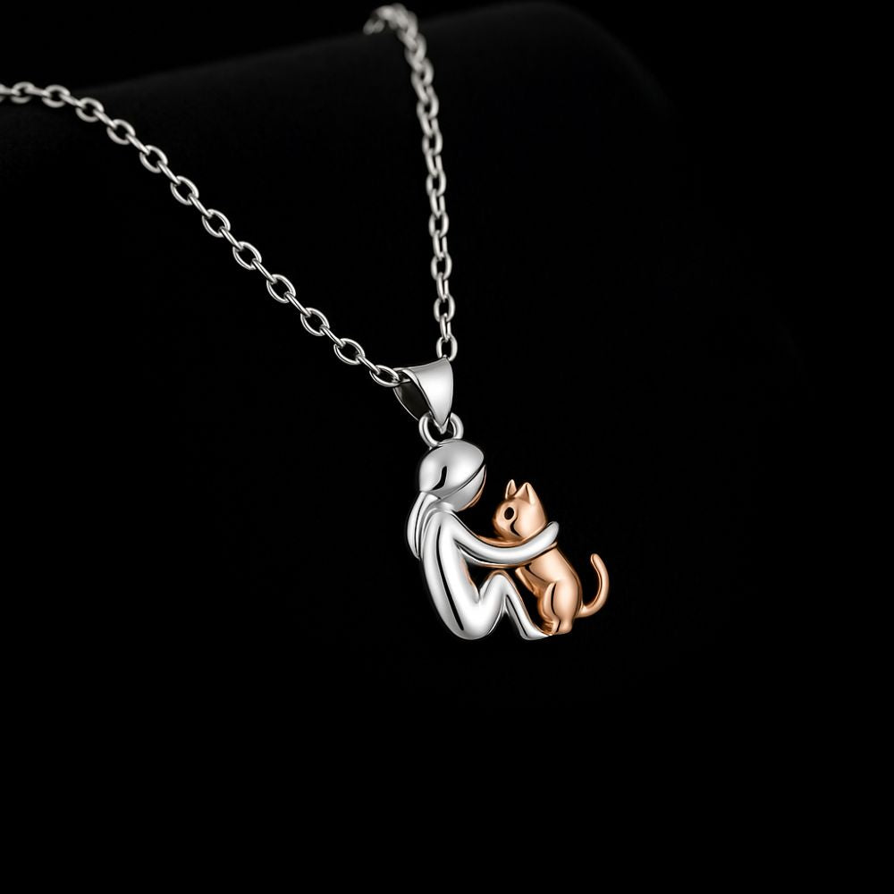 Hangerketting met katmotief en bijpassende oorbellen