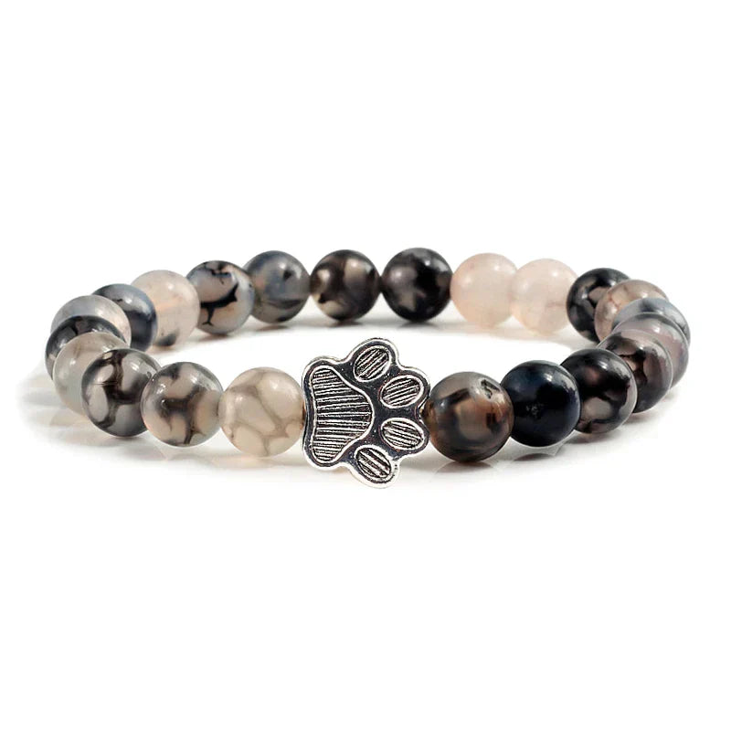 Armband met kralen en pootmotief