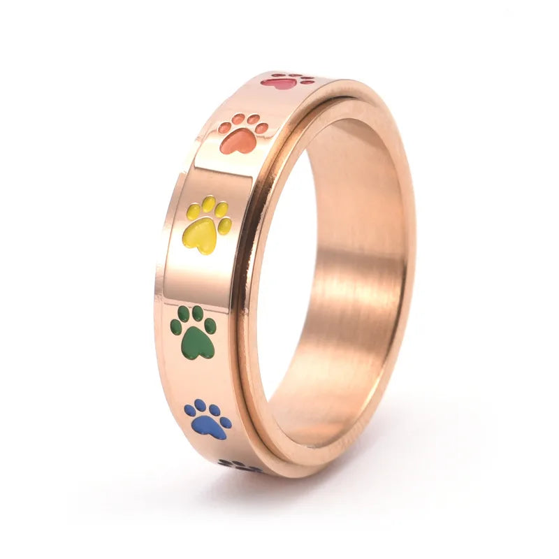 Draaibare ring met pootmotief in roestvrij staal