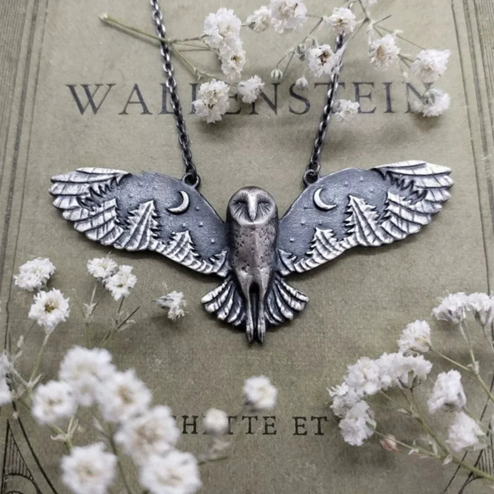 Ketting met uil- en maanmotief
