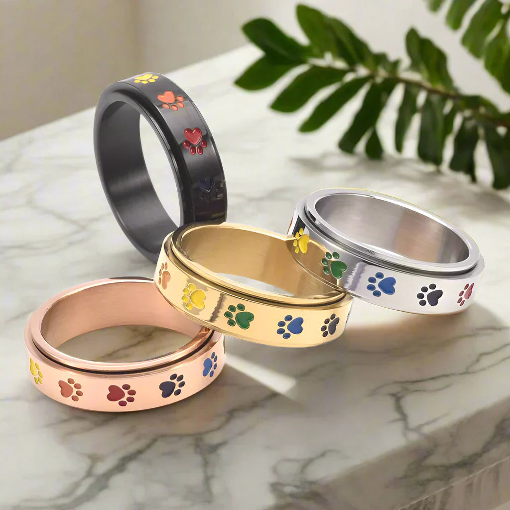 Draaibare ring met pootmotief in roestvrij staal