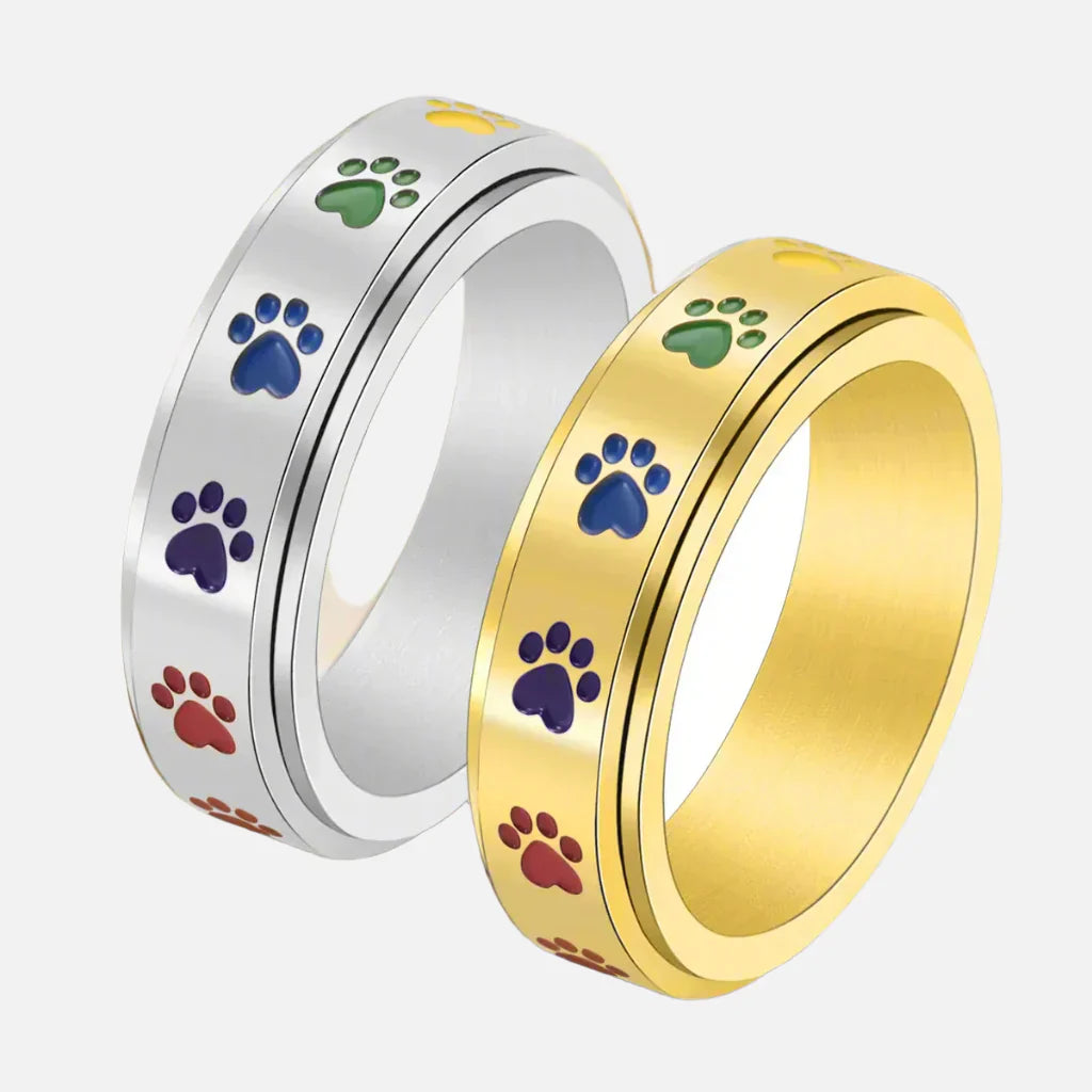 Draaibare ring met pootmotief in roestvrij staal