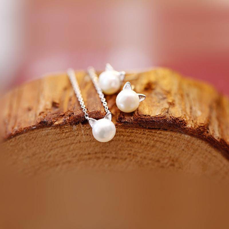 Ketting, oorbellen en ring met katmotief